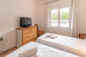 Posteľ alebo postele v izbe v ubytovaní Les Algues Encantador apartamento en el centro