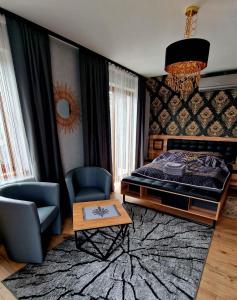 Postel nebo postele na pokoji v ubytování Willa "KomaNcza" Szczawnica
