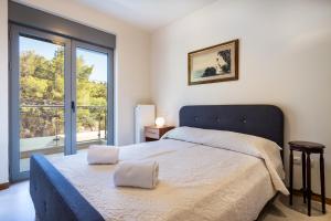 Φωτογραφία από το άλμπουμ του Deluxe Maisonette With Shared Pool 1# στην Ανάβυσσο