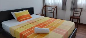 Postel nebo postele na pokoji v ubytování Jays Guest - Rajagiriya Colombo
