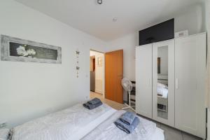 Posteľ alebo postele v izbe v ubytovaní Modernes Appartement nahe U-Bahn und Schönbrunn