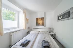 Posteľ alebo postele v izbe v ubytovaní Modernes Appartement nahe U-Bahn und Schönbrunn