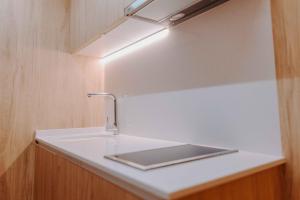 Apartamentos Santa Isabel的厨房或小厨房