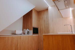 Apartamentos Santa Isabel的厨房或小厨房