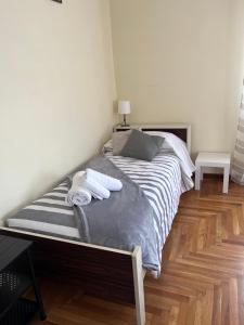 Appartamenti Ziliotto tesisinde bir odada yatak veya yataklar