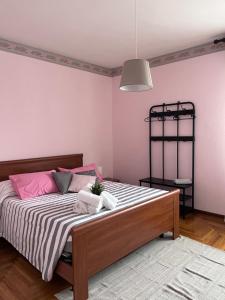 Postelja oz. postelje v sobi nastanitve Appartamenti Ziliotto