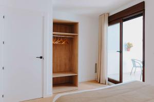 Apartamentos Santa Isabel客房内的一张或多张床位