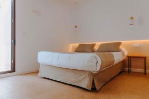 Apartamentos Santa Isabel客房内的一张或多张床位