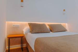 Apartamentos Santa Isabel客房内的一张或多张床位
