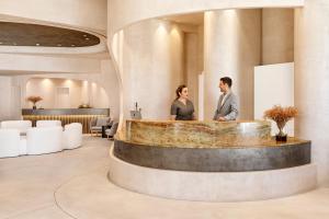Гости Santo Pure Oia Suites & Villas