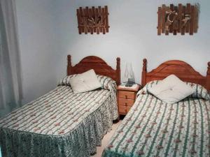 Postel nebo postele na pokoji v ubytování Apartamento Salamanca 38 en Santa Pola