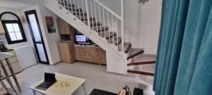 Telewizja i/lub zestaw kina domowego w obiekcie HATO Holiday Home Fuerteventura
