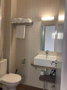 Koupelna v ubytování Hôtel Oxo