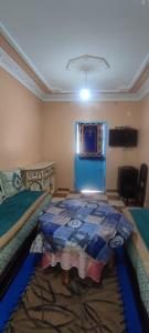Voodi või voodid majutusasutuse Mehdi House toas