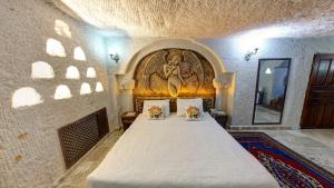 Postel nebo postele na pokoji v ubytování Roc Of Cappadocia