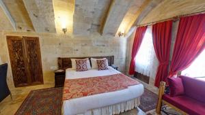 Postel nebo postele na pokoji v ubytování Roc Of Cappadocia
