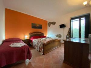 Postel nebo postele na pokoji v ubytování AsceaExperience Rooms