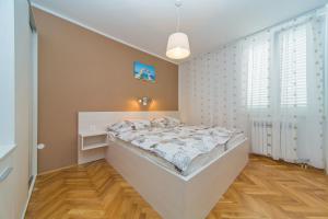 Posteľ alebo postele v izbe v ubytovaní Villa Narona