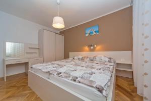 Posteľ alebo postele v izbe v ubytovaní Villa Narona