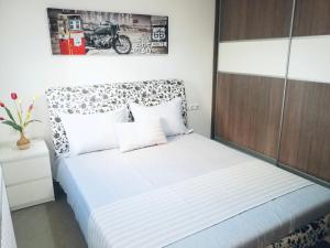 Кровать или кровати в номере The little palace next to the sea