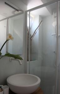 a bathroom with a white sink and a shower at Il Fiordo in Conca dei Marini +59 photos