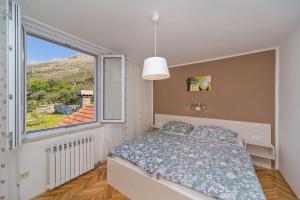 Posteľ alebo postele v izbe v ubytovaní Villa Narona
