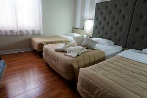Postel nebo postele na pokoji v ubytování Hotel Sant'Elia