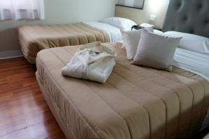 Postel nebo postele na pokoji v ubytování Hotel Sant'Elia