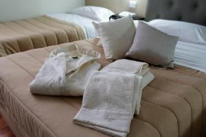 Postel nebo postele na pokoji v ubytování Hotel Sant'Elia