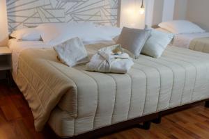 Postel nebo postele na pokoji v ubytování Hotel Sant'Elia