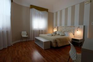 Postel nebo postele na pokoji v ubytování Hotel Sant'Elia