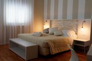 Postel nebo postele na pokoji v ubytování Hotel Sant'Elia