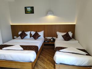 Habitación de hotel con 2 camas en GRAND ONE TOWER, en Chennai