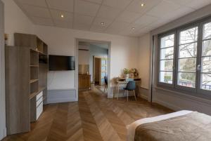 Fotografia z galérie ubytovania Résidence Harmonie Appartement N 1 Haut de gamme Avec Petit Déjeuner v destinácii Néris-les-Bains