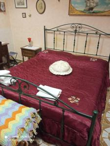 Postel nebo postele na pokoji v ubytování La Casetta del Sole