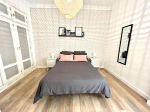 Posteľ alebo postele v izbe v ubytovaní Apartamento centro historico