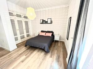 Posteľ alebo postele v izbe v ubytovaní Apartamento centro historico