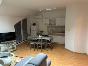 A kitchen or kitchenette at Kondé Apartments A