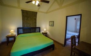 מיטה או מיטות בחדר ב-Eco Venao Lodge, Playa Venao