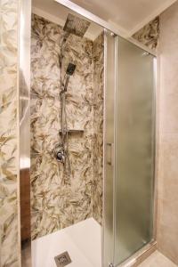 Kúpeľňa v ubytovaní Biscione Large Apartment - Campo de Fiori by YourHost