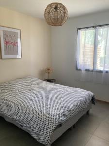 Posteľ alebo postele v izbe v ubytovaní Ferme Hôtel Boulage