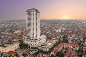 an overhead view of a tall white building at Meliá Vinpearl Phu Ly in Phủ Lý