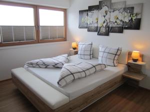 Postel nebo postele na pokoji v ubytování Ferienwohnung Oberkreut