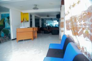 Χώρος καθιστικού στο Hotel Prasanna