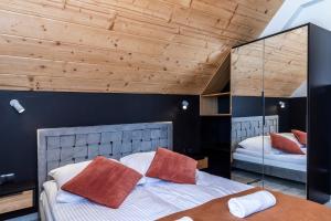 Posteľ alebo postele v izbe v ubytovaní Apartament Czorsztyn 2