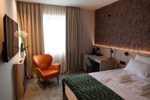 Postel nebo postele na pokoji v ubytování HOTEL GRACIAN + 37 fotografií