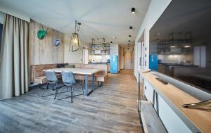 Η κουζίνα ή μικρή κουζίνα στο THOMSN Central Hotel & Appartements