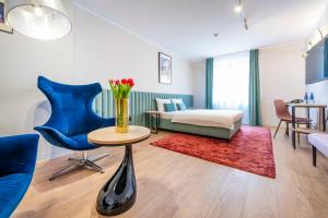 Posteľ alebo postele v izbe v ubytovaní Hotel H12****