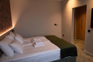 Postel nebo postele na pokoji v ubytování HOTEL GRACIAN
