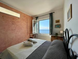 Postel nebo postele na pokoji v ubytování La Tua Villa Sul Mare [Vista Aperta - Free Parking - WIFI ]